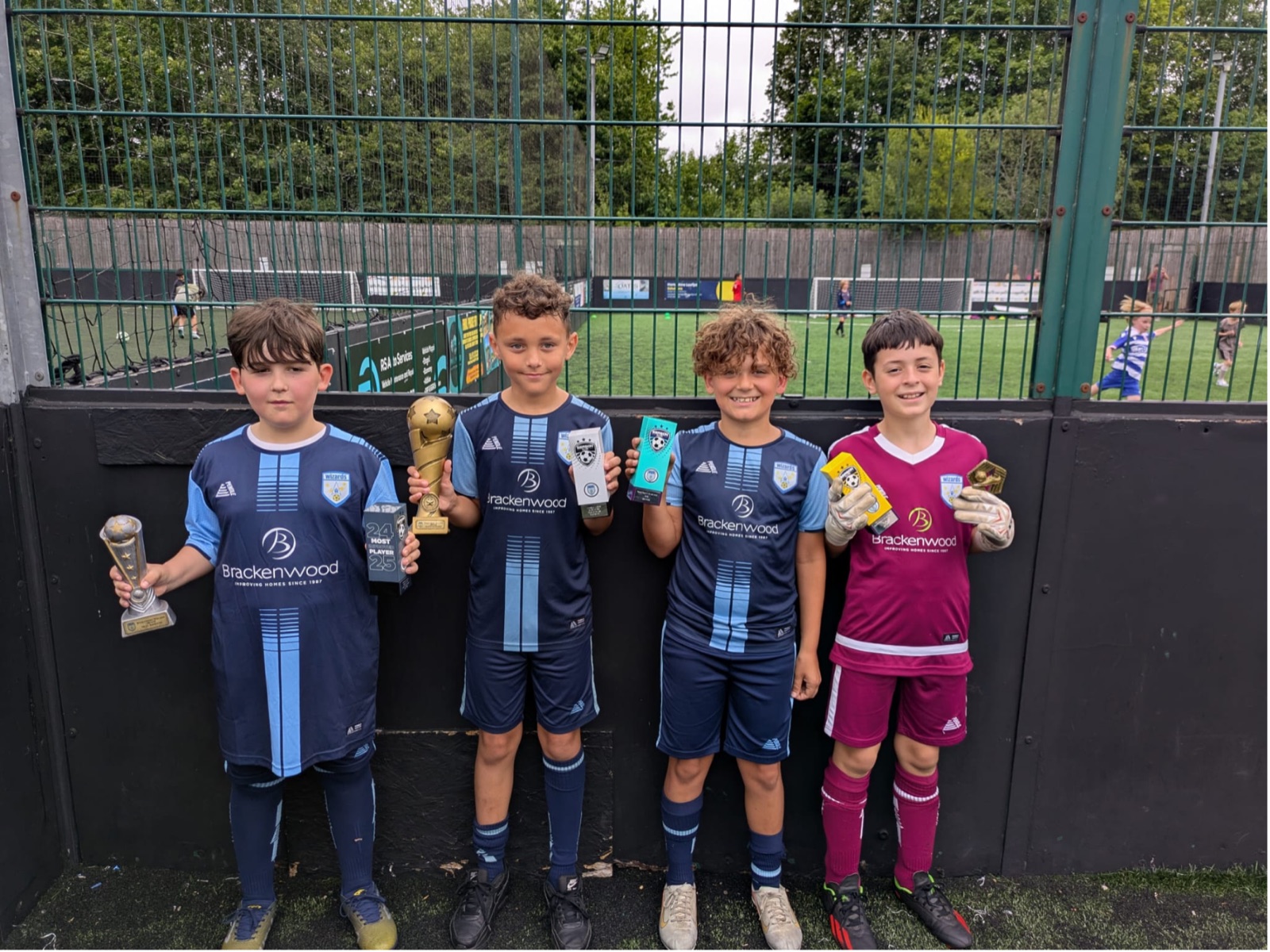 Winklebury Wizards players with their trophies at the 2025 end-of-season ceremony